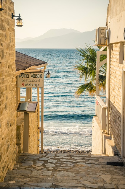 Destination Crete picture of taverna area by beach front