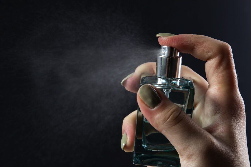 Fragrances spritzing cologne bottle